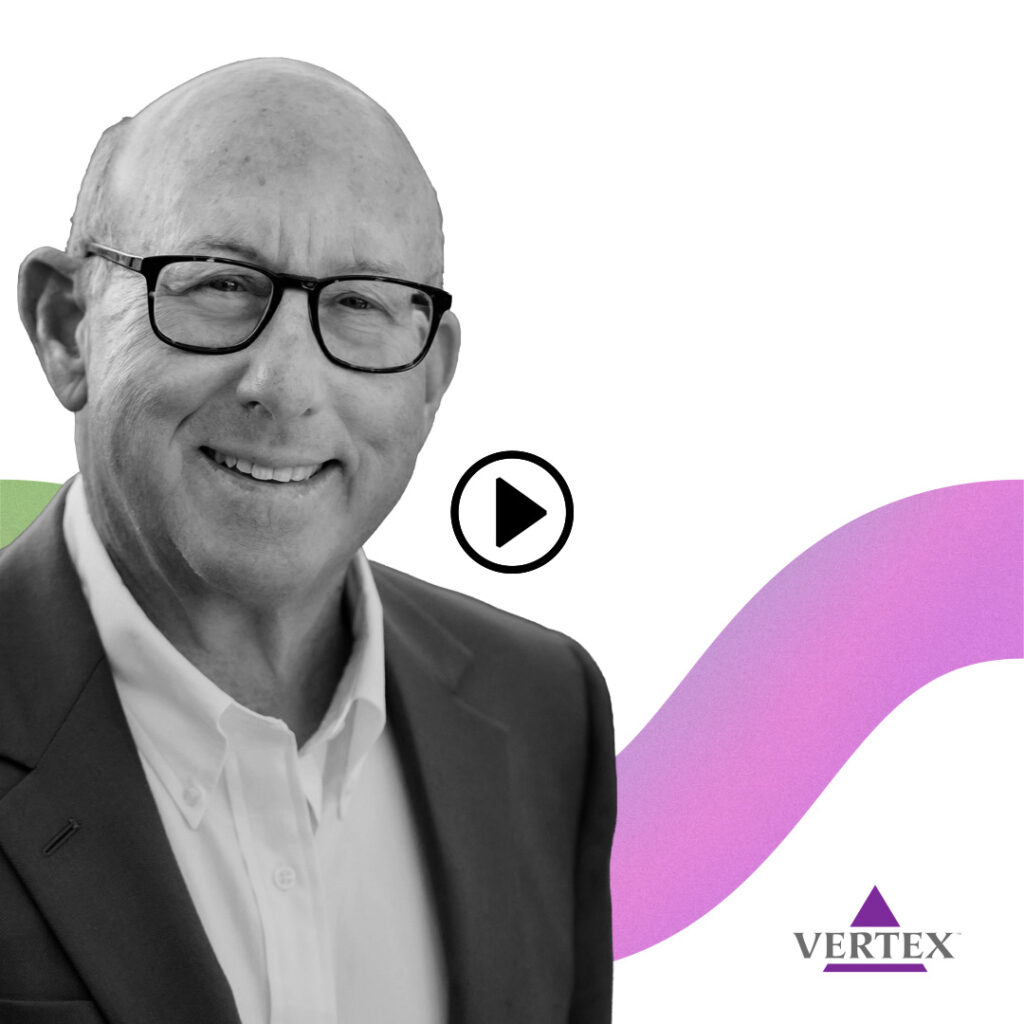 Video thumbnail: grayscale portrait of a smiling man in a suit and glasses, with a pink-purple curved background and Vertex logo; play button overlaid.